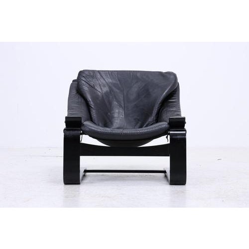 Vintage leather armchair by Åke Fribytter for Nelo from the 1970s with a striking, cantilevered shape and clean...