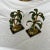 A pair of Metal Two Lights Palm Tree Candle Holders. Hand made in Italy.