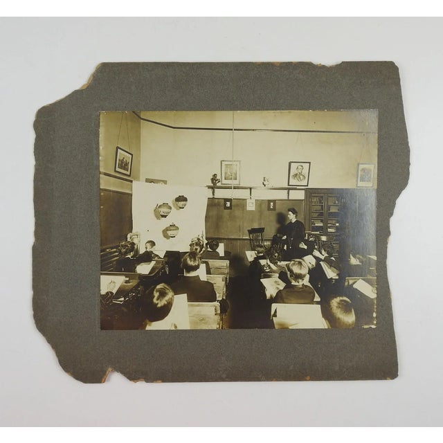 Silver gelatin circa 1900 photograph of school room during art class. Everyone is drawing Chinese lanterns, picture of...
