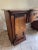 A single antique mahogany sideboard or buffet featuring a two cabinet base and shaped single drawer top with original...