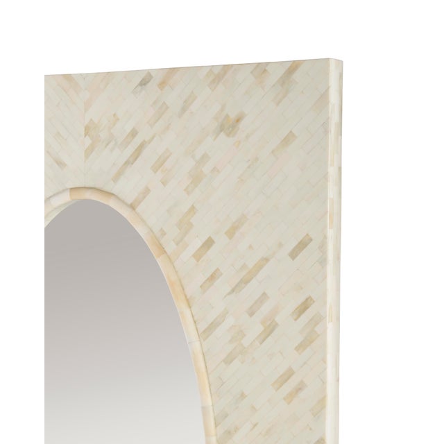 Large bone mirror in diagonally inlaid tile and oval mirror.