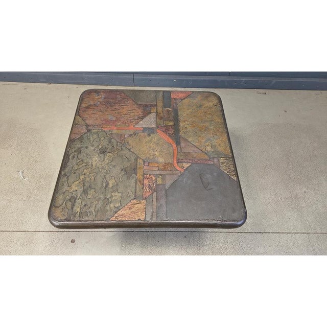 Square brutalist style coffee table, signed C. Kneip 91. Slate stone table top with inlaid stones and brass materials 1991...
