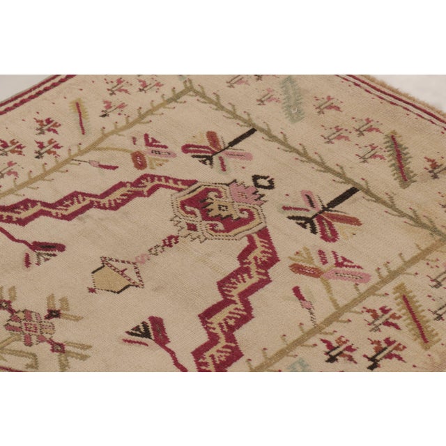Hand-knotted in wool circa 1860-1869, this 3x5 antique Turkish Ghiordes rug is a magnificent addition to Rug & Kilim's...