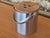 This mid-century modern ice bucket combines durable stainless steel with a warm, teak wood lid. Designed in a classic...