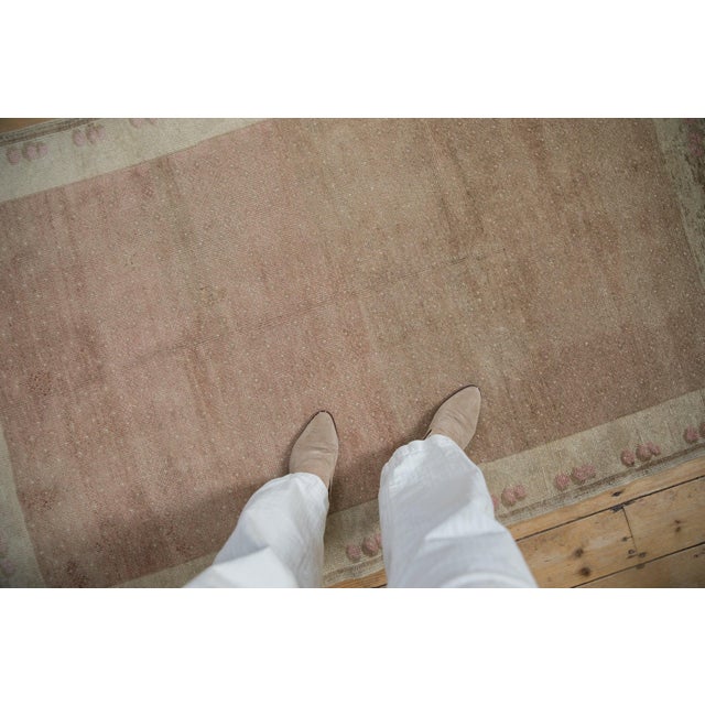 :: Allover covered field of diamond shaped panels in small scale with interior single blossoms wrapped by a cluster of...