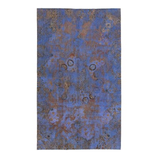 Antique Persian Blue Overdyed Wool Rug With Allover Floral Pattern For Sale