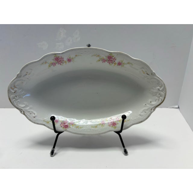 Antique English oval serving platter crafted in fine porcelain by W. H. Grindley & Co., Stoke-on-Trent, circa early 20th...