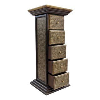 Unique Wooden Pedestal With Drawers Accented With Hand Embossed Brass Foil For Sale