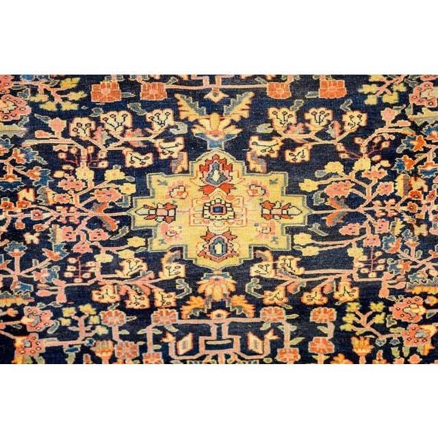 An unbelievable late 19th century Persian Sarouk Farahan rug with the most incredible trellised floral and vine pattern...