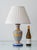 A ceramic talavera table lamp in the classic blue, white and ochre or saffron yellow-orange, hand-painted by the renowned...