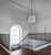 Elevate your space with the award-winning Boyd Globe Chandelier in Black, exclusively at circa20c. Winner of the ADEX...