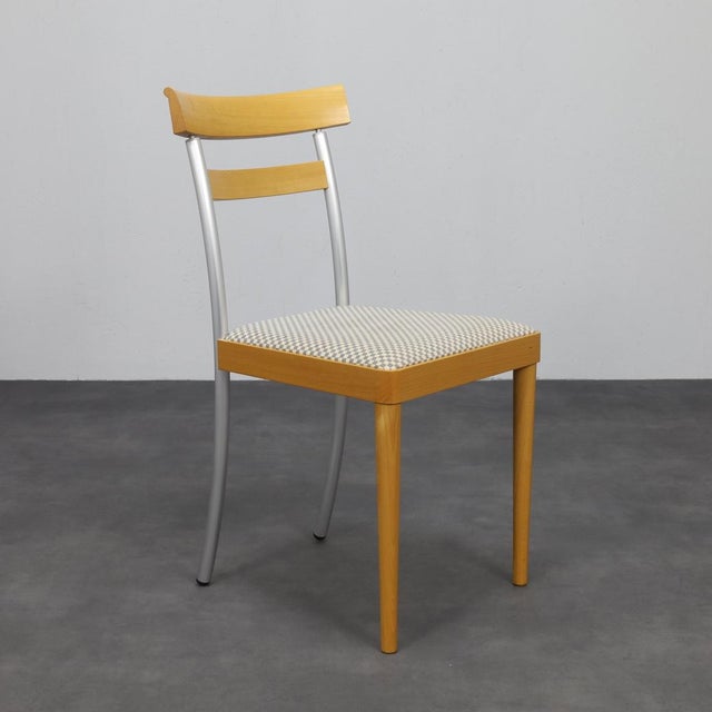 This original set of 8 dining chairs was designed and produced in the 1990s by Dutch brand Arco, known for its high-...