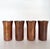 Set of 4 vintage Chinese hand-hammered copper-plated tin cups with Bauhaus styling. The cup's hammered decoration starts...