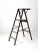 This is a vintage wooden ladder. The teal blue wood platform ladder features four step rungs with a top platform step,...