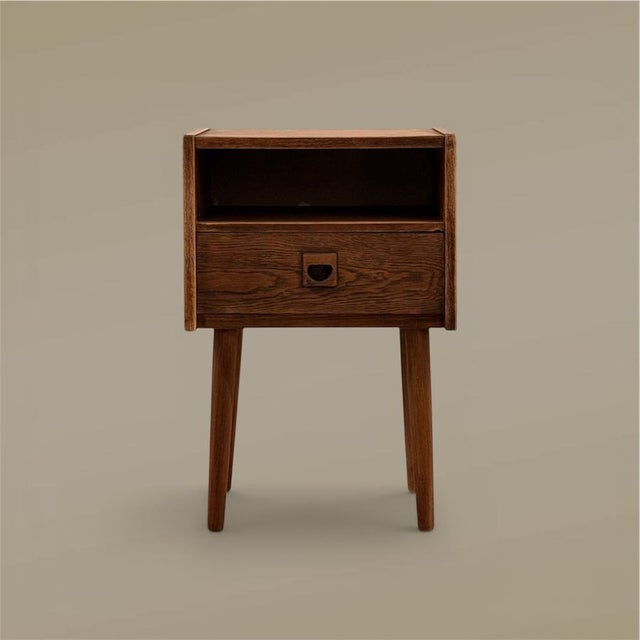 Vintage danish bedside table designed by brouer and produced in denmark during the 1960s. executed in oak with a drawer...