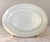 Beautiful vintage Anchor Hocking milk glass serving platter featuring an elegant scalloped edge and graceful swirling...