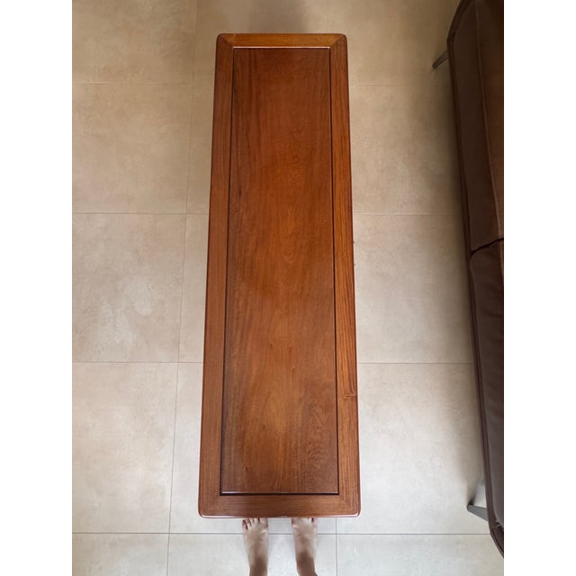This is a vintage solid rosewood coffee table that comes with 3 drawers in good working condition. The drawers are...