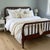 A beautifully aged antique Jenny Lind spindle bed, featuring classic turned “spool” bobbin detailing associated with...