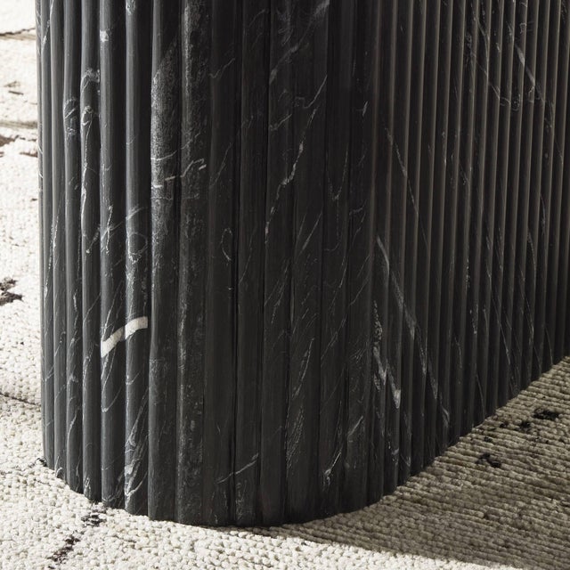 Italian-inspired for effortless sophistication. A swirling marble base is scalloped for a linear look with heavy texture....