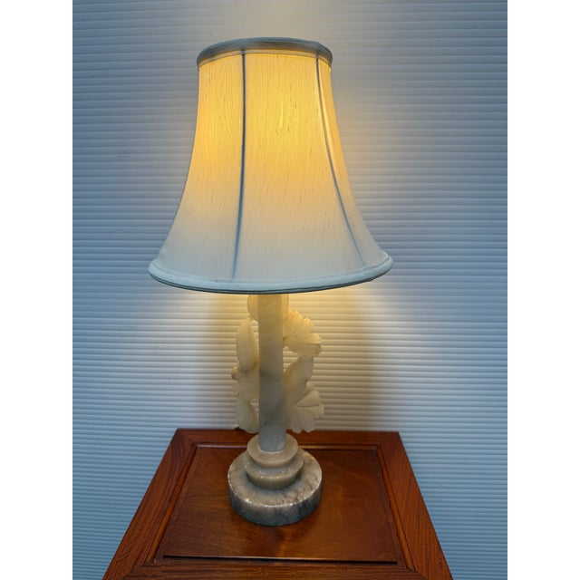 Design Plus Gallery presents an Alabaster Table Lamp. The lamp base was carved from Italian alabaster to mimic designs...