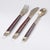 A modern brass and wood cutlery set designed by Carl Cohr in the 1960s in Denmark. This elegant set, comprising six...