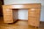 This is a classic mid-century modern desk, crafted from solid Northern Yellow Birch by the Heywood-Wakefield Company in...