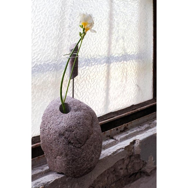 The sitter purple granite found flower vessel by studio do dimensions: d 17 x w 9 x h 35 cm materials: stainless steel,...
