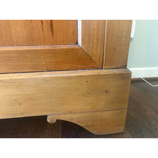 This French Louis Philippe sideboard crafted in warm, honey-toned cherrywood, dating to the mid-19th century. This piece...
