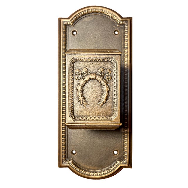 This handsome set of four solid bronze sconces are of an atypical sconce design. They have a straightforward structure...