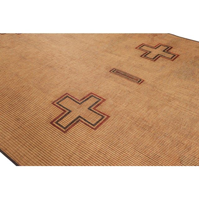 This oversized vintage Moroccan floor covering is a 9x18 Tuareg mat from the nomadic tribe of the same name. Handwoven...