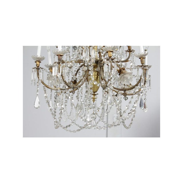 An antique chandelier from the turn of the century. Year: around 1900 Origin: France Dimensions: height 115 cm width 95 cm...