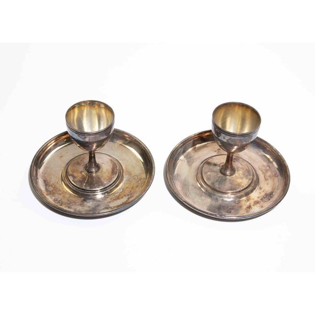 Pair of Silver-Plated Egg Cups with Underplates, Europe, mid-20th century. Elegant pair of silver-plated egg cups with...