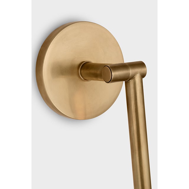 Cona Large Sconce in Antique-Burnished Brass Designer: Kelly Wearstler Finish: Antique-Burnished Brass Height: 26.25"...