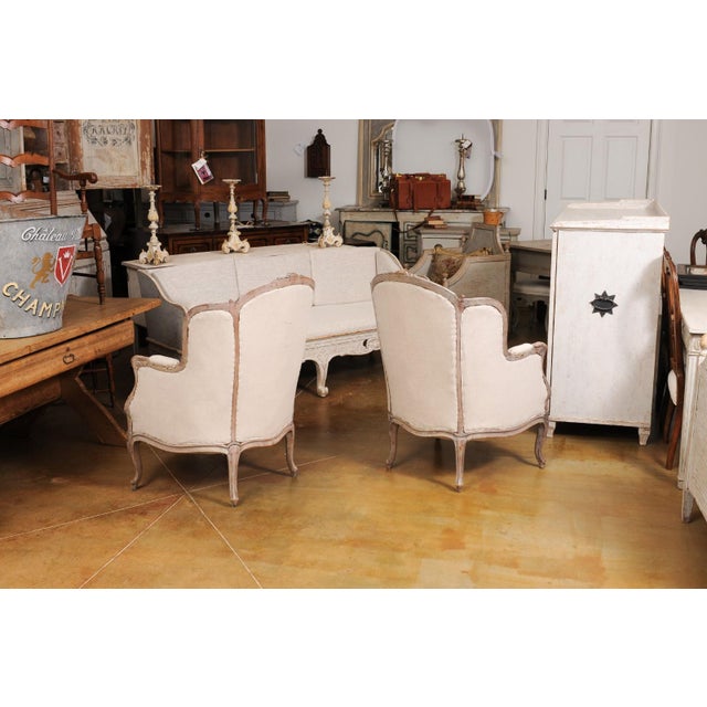 French Louis XV Style 1880s Painted Bergère Chairs with Carved Floral Motifs - A Pair For Sale - Image 11 of 12