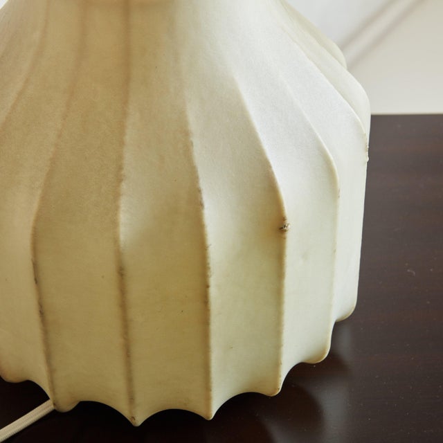 A Mid Century Italian ‘Gatto’ table lamp designed by Achille & Pier Giacomo Castiglioni for Flos in the 1960s. This...