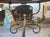 A French 1970s Wrought Iron and Brass Dining Table With Smoked Glass Top For Sale In Dallas - Image 6 of 18