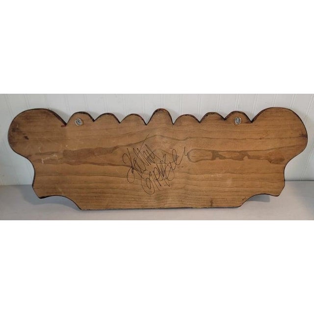 This contemporary artist signed on the reverse hand carved & painted wall rack with hand forged iron hooks on the face of...