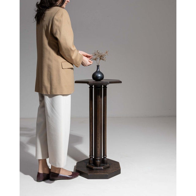 Ebonized column pedestal in Deep Ebony Black. Finished in deep ebony black, this ebonized column pedestal is distinguished...