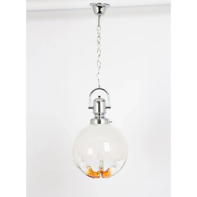 Ceiling light with large volcanic murano glass dome with a metal frame, italy. Wonderful light effect. Good condition....
