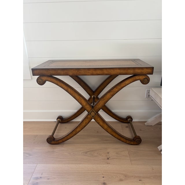 Elegant craftsmanship and timeless design define this exceptional Kreiss console table, showcasing the sophisticated blend...
