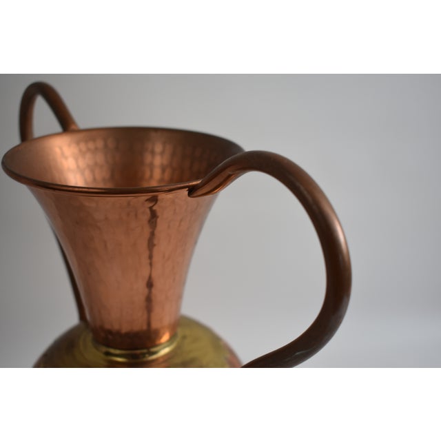 Large ornamental copper vase with brass color from the village of "Villedieu les poelles" in Normandie France. A poelle...