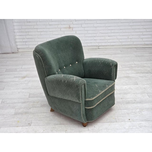 1960s, Danish armchair. Light green furniture wool, oak wood legs, brass springs in the seat. Original good condition: no...
