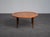 A beautifully proportioned Danish coffee table from the 1960s, crafted in teak. The round top with its subtly raised edge...