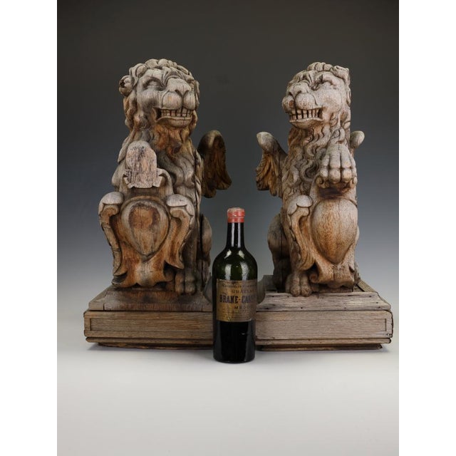 Pair of 19th Century French Neo-Renaissance Heraldic Lion Sculptures An exceptional and highly imposing pair of French...