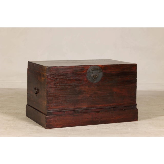 Antique Reddish Brown Lacquered Elm Trunk with Brass Lock and Raised Base For Sale In New York - Image 6 of 11