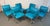 This set of six vintage mid-century dining chairs features striking blue vinyl upholstery with classic flat bar chrome...
