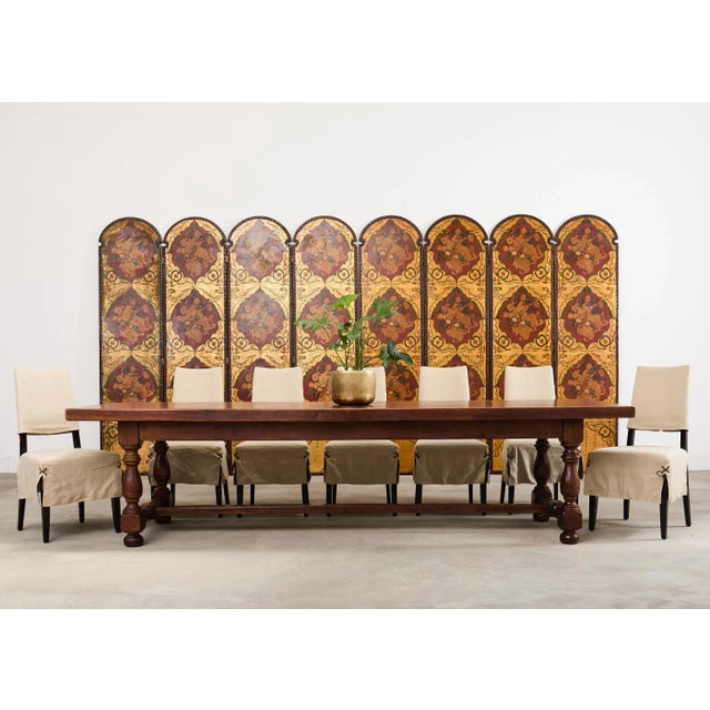 Radiant Spanish colonial style eight-panel folding screen featuring polychromed leather decorated in the baroque taste....