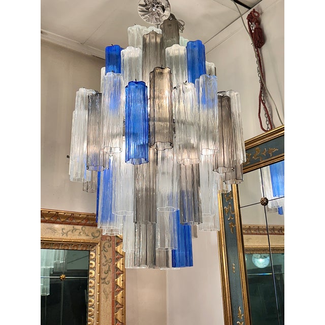 Contemporary Modern “tronchi” Murano Glass Sputnik Chandelier in Venini style. Transparent, gray and blue colors give a...