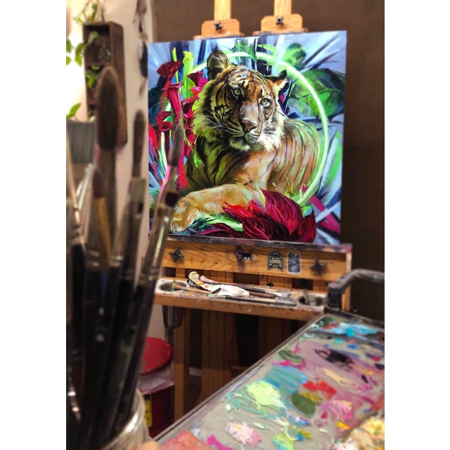 This artwork features a Sumatran tiger, elegantly poised amidst vibrant flora that enhances its majestic presence. The...