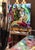 This artwork features a Sumatran tiger, elegantly poised amidst vibrant flora that enhances its majestic presence. The...